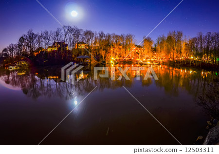 peaceful night view over the lake 12503311