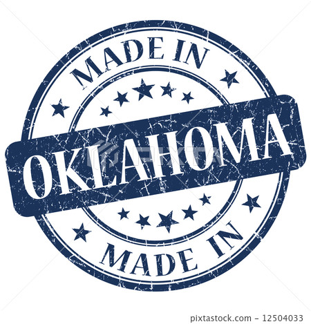 made in Oklahoma blue round grunge isolated stamp 12504033