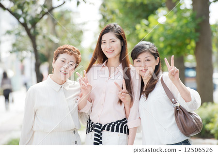 Third generation women's travel scene 12506526