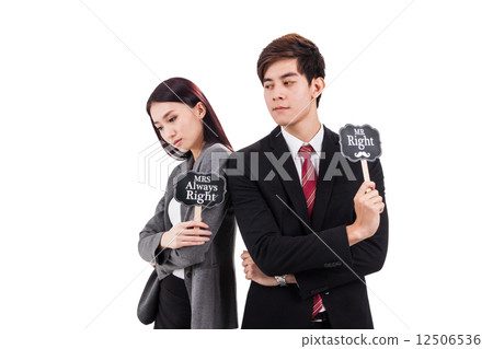 Office couple posing back to back holding placard 12506536
