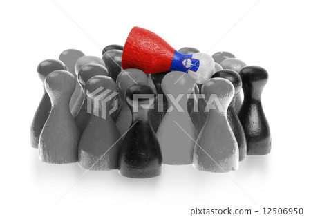 One unique pawn on top of common pawns One unique pawn on top of common pawns 12506950