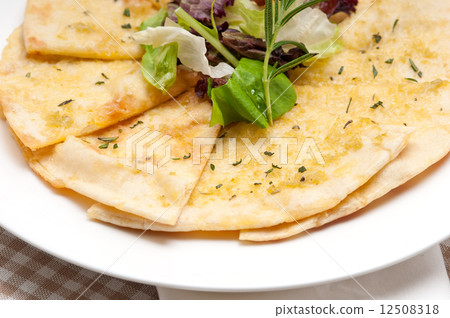 garlic pita bread pizza with salad on top garlic pita bread pizza with salad on top 12508318