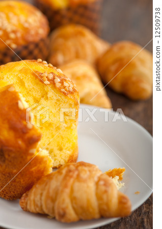 fresh baked muffin and croissant mignon fresh baked muffin and croissant mignon 12509738