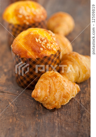 fresh baked muffin and croissant mignon fresh baked muffin and croissant mignon 12509819