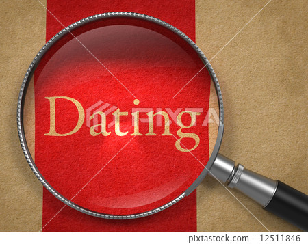 Dating - Magnifying Glass on Old Paper. 12511846