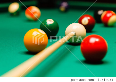 Billiard balls in a pool table. 12512034