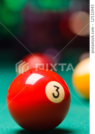 Billiard balls in a pool table. 12512043