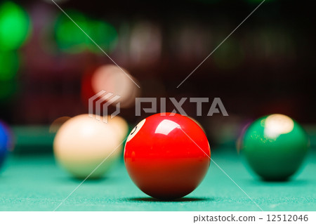 Billiard balls in a pool table. 12512046