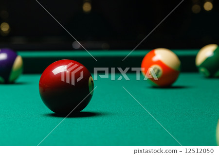 Billiard balls in a pool table. 12512050
