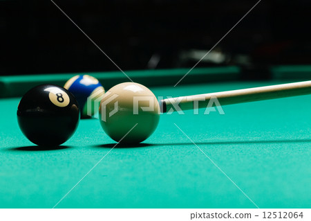 Billiard balls in a pool table. 12512064