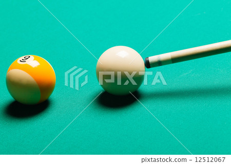 Billiard balls in a pool table. 12512067