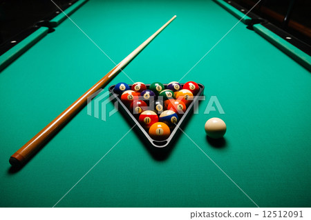 Billiard balls in a pool table. 12512091