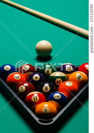 Billiard balls in a pool table. 12512099
