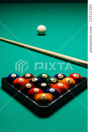 Billiard balls in a pool table. 12512105