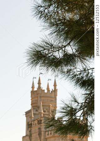 crimean pine tree and Swallow Nest castle, Crimea 12512553
