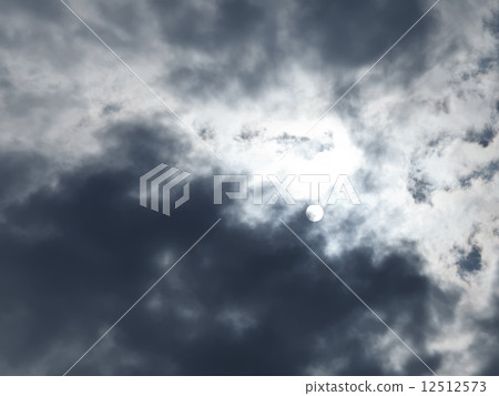 sun lit through grey rainy clouds in autumn sun lit through grey rainy clouds in autumn 12512573
