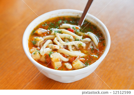 lagman soup in white bowl 12512599