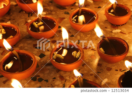 oil lamp during prayer oil lamp during prayer 12513034