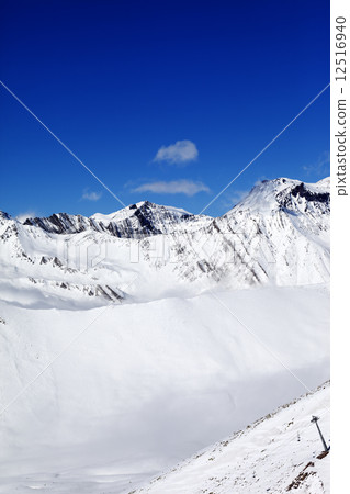 Snowy mount at sunshine day 12516940