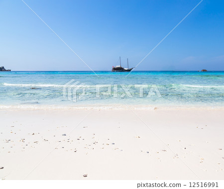 White sand beach and turquoise blue sea White sand beach and turquoise blue sea 12516991