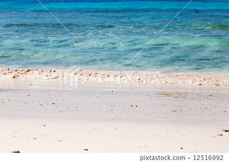 White sand beach and turquoise blue sea White sand beach and turquoise blue sea 12516992