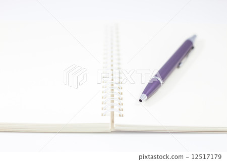 Pen and spiral notebook isolated on white background 12517179