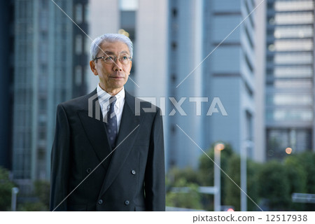 Executive in a skyscraper at dusk Executive in a skyscraper at dusk 12517938