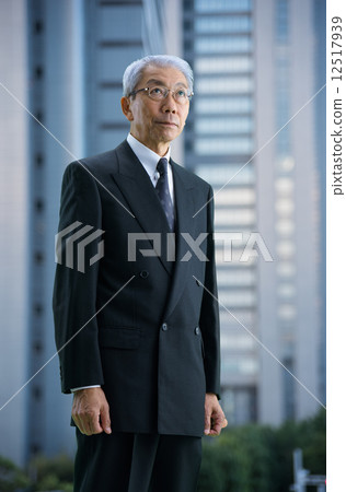 Executive in a skyscraper at dusk Executive in a skyscraper at dusk 12517939