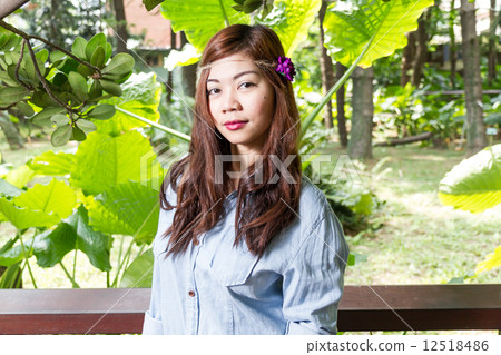 Filipina woman in a garden 12518486