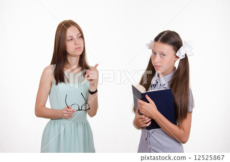 The teacher gives the student a mandate 12525867