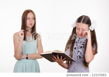 School teacher scolds distressed student 12525883