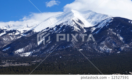 High mountain covers by snow in the winter 12527591