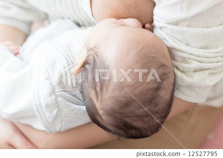 Breast feeding 2 months old baby 12527795