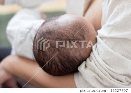 Breast feeding 2 months old baby 12527797