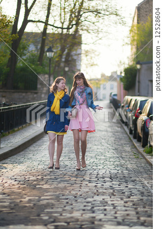 Girls walking together and chatting 12528604