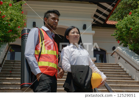 Male engineer and lady executive. Male engineer and lady executive. 12529051