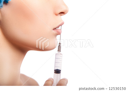 Cosmetic injection to the pretty woman face 12530150