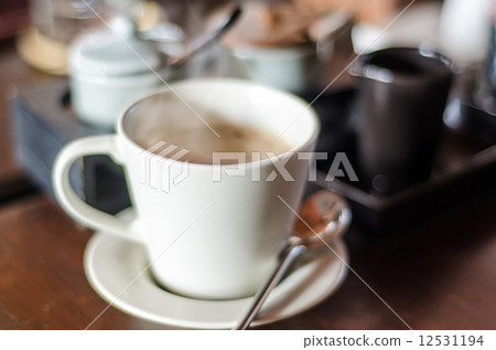 Hot coffee in a White Cup Hot coffee in a White Cup 12531194