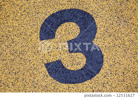 Number Three sign on sand fome 12531627