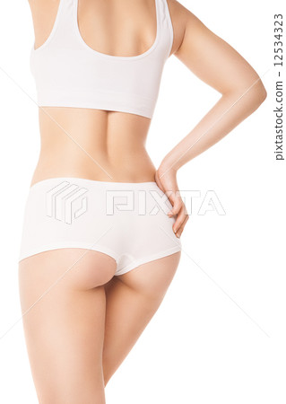 Beautiful fit sexy female body isolated on white 12534323