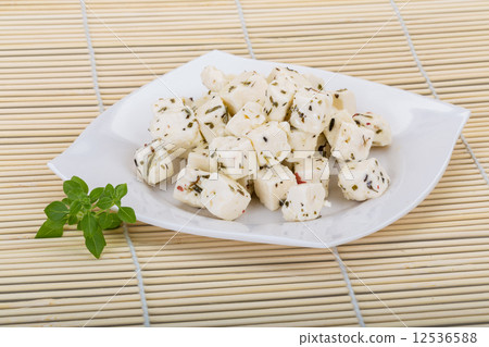 Cheese with spices and oil Cheese with spices and oil 12536588