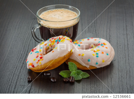 Coffee with donuts 12536661
