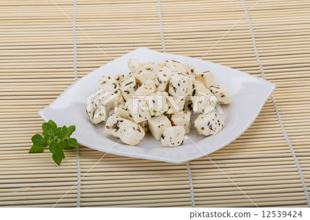 Cheese with spices and oil Cheese with spices and oil 12539424