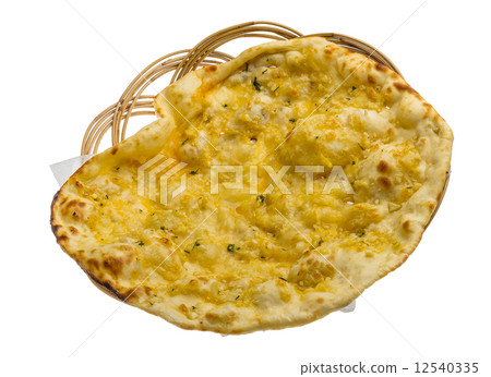 Naan with cheese and garlic Naan with cheese and garlic 12540335