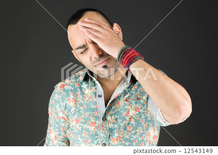 model isolated on plain background confused headache model isolated on plain background confused headache 12543149
