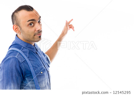 model isolated on plain background looking at camera pointing model isolated on plain background looking at camera pointing 12545295