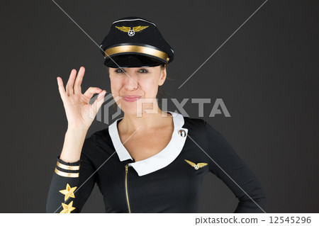 model isolated on plain background hand gesture ok sign 12545296