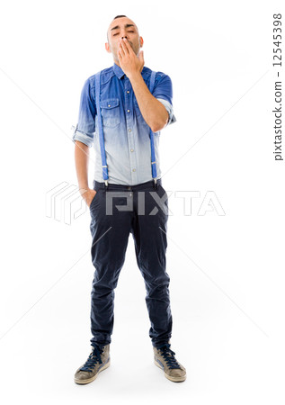 model isolated on plain background tired bored yawning model isolated on plain background tired bored yawning 12545398