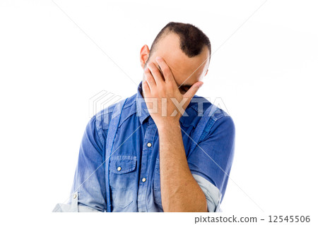 model isolated on plain background ashamed hiding face in hand model isolated on plain background ashamed hiding face in hand 12545506