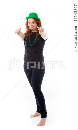 model isolated on plain background fingers pointing to camera 12545807